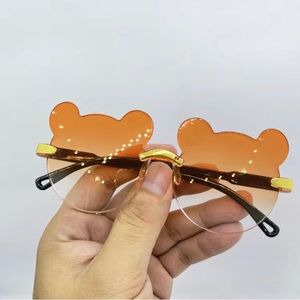 Kid Orange Bear Sunglasses
NWT
Make An Offer!